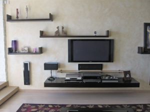 shelves above TV in living room