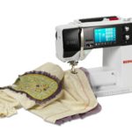 The sewing machine needle should be on the left.