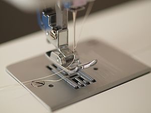 how to insert thread into a sewing machine