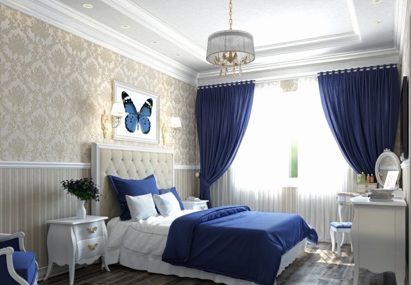 Blue and white bedroom interior.