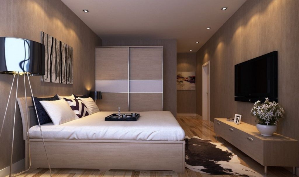 Bedroom with a high bed.