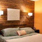 The height of the sconce above the bed in the bedroom.