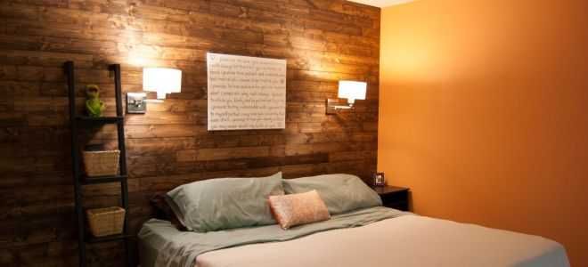 The height of the sconce above the bed in the bedroom.