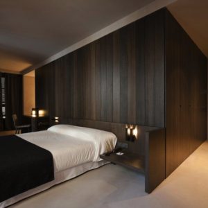 Bed in a minimalist bedroom