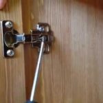 how to fix a cabinet door