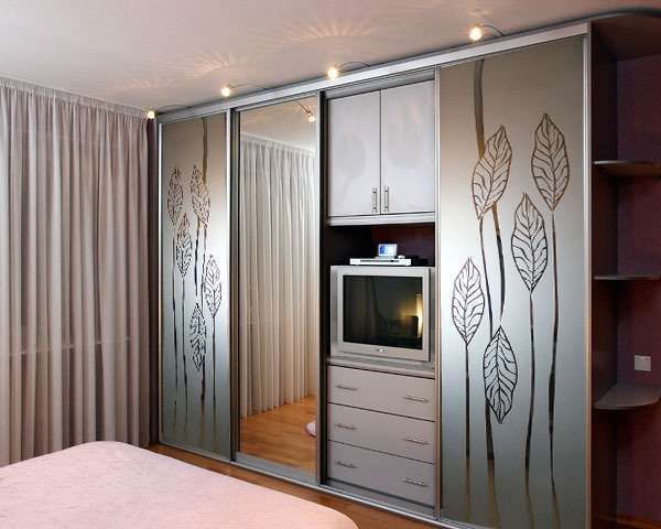 Wardrobe with TV in the middle