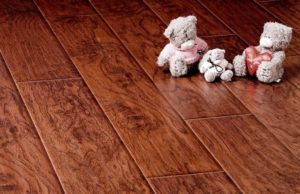 Which is warmer, linoleum or laminate?