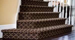 Staircase with carpet.
