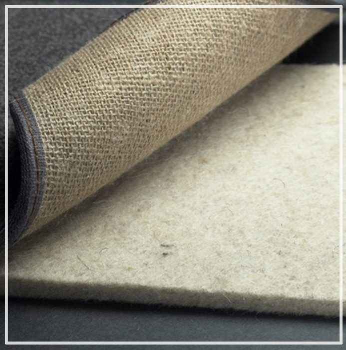 Underlay for carpet on a wooden floor.