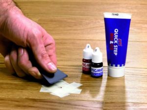 how to repair a chip in laminate flooring