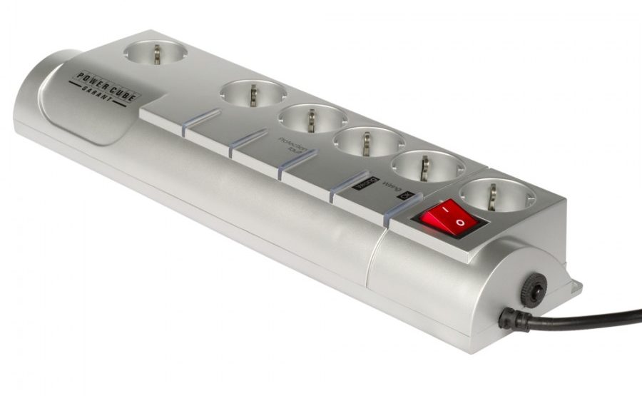 The presence of a button on the surge protector.