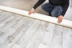 Which is warmer, linoleum or laminate?