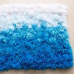 blue and white pompom rug
