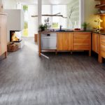 dark linoleum in the kitchen is practical.