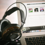 Headphones and computer.