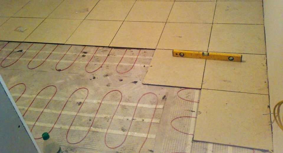 Plywood over warm floor.