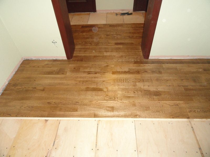Parquet on plywood.