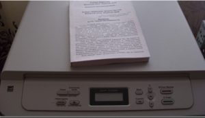 Printing a book on a printer.