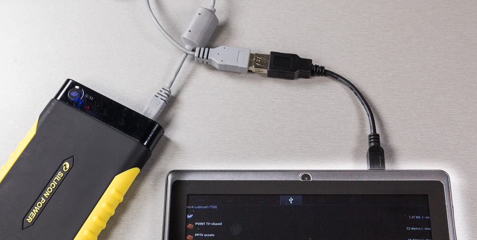 Connecting a hard drive to the tablet.