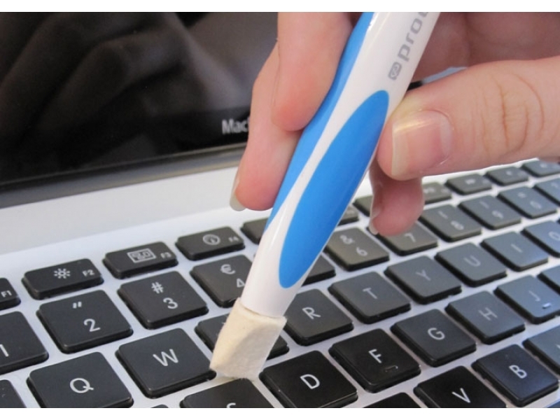 Brush for cleaning a laptop.