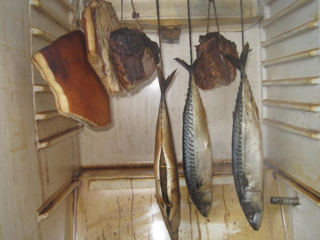 Smoked meats in the smokehouse from the refrigerator.
