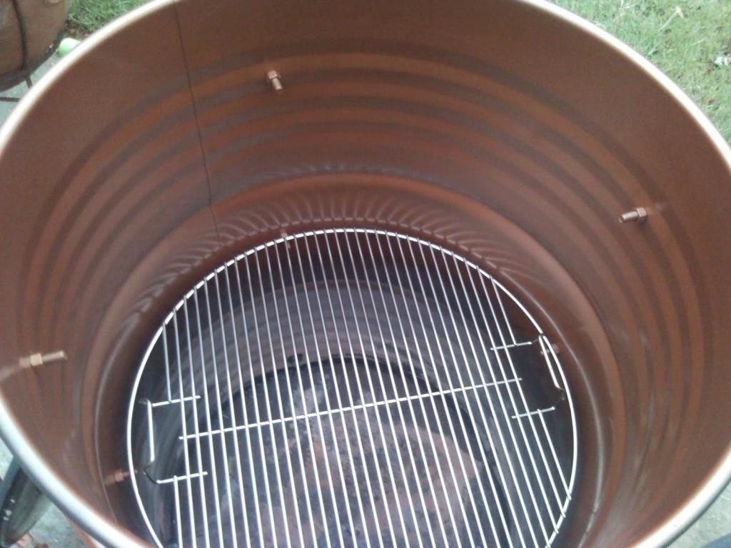 Round grate for smokehouse.
