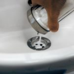 Pour salt into the sink.