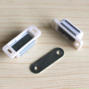 Magnetic latch for cabinet door.