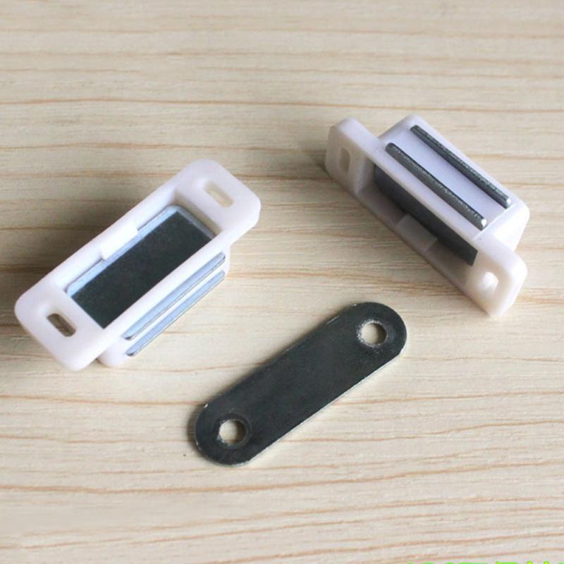 Magnetic latch for cabinet door.