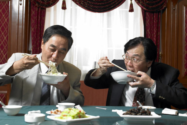 Why do Asians eat with sticks?