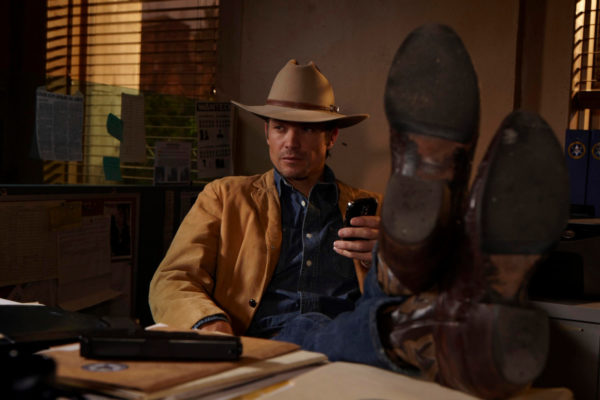 Legs thrown up on the table