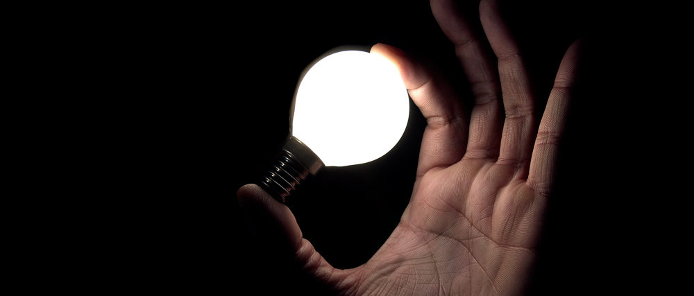 A familiar light bulb in hands
