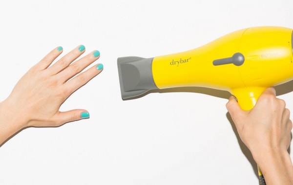 Using a hairdryer can significantly speed up the drying of the varnish.