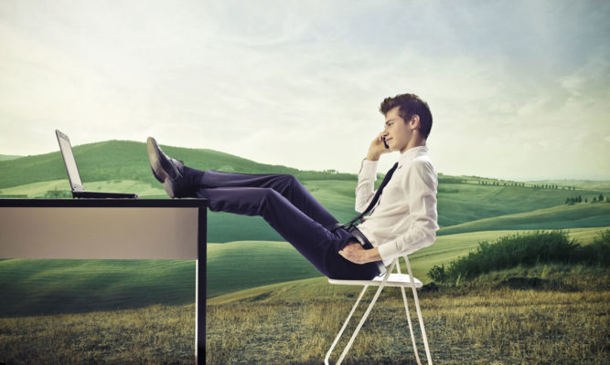 Legs thrown up on the table