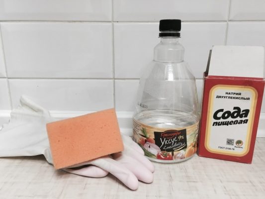 Wipe the stove with vinegar