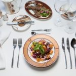 Why do they serve 2 forks and 2 knives in a restaurant?