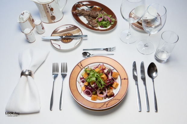 Why do they serve 2 forks and 2 knives in a restaurant?