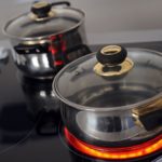 Dishes on a glass-ceramic stove.