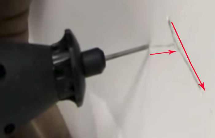 We widen the crack with a drill.