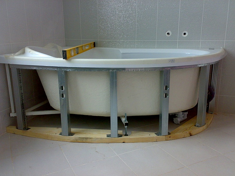 Installation of an acrylic bathtub.