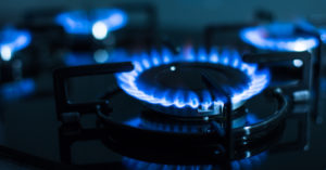 What is the gas consumption of a gas stove per hour?