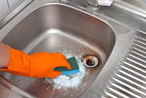cleaning the sink
