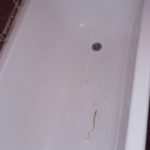 Crack in acrylic bathtub.