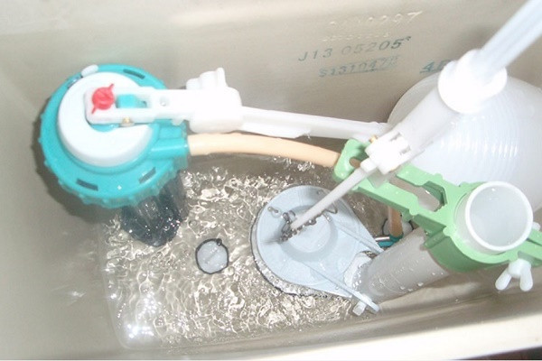 Water slowly fills into the tank.