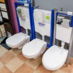 Wall-hung toilet with installation.