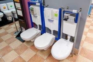 Wall-hung toilet with installation.