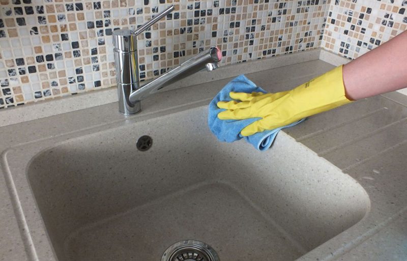 How to clean an artificial stone sink.