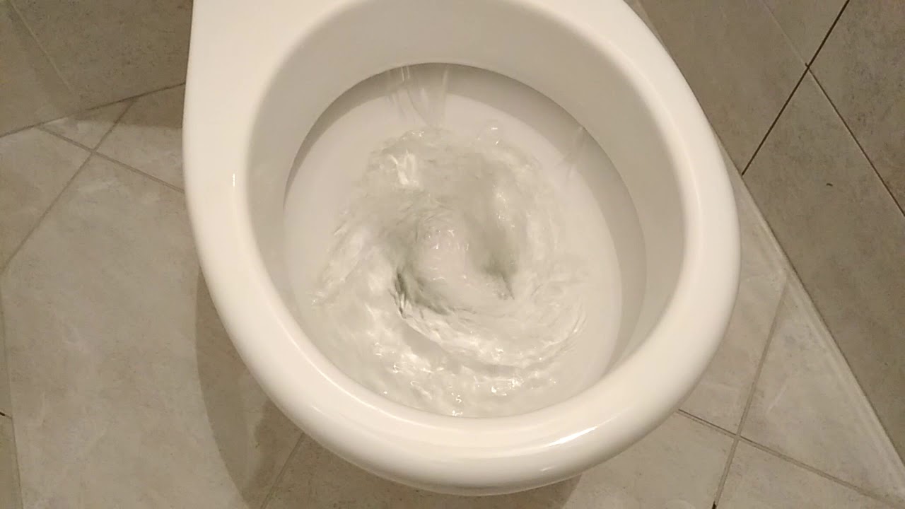 Flushing the toilet.