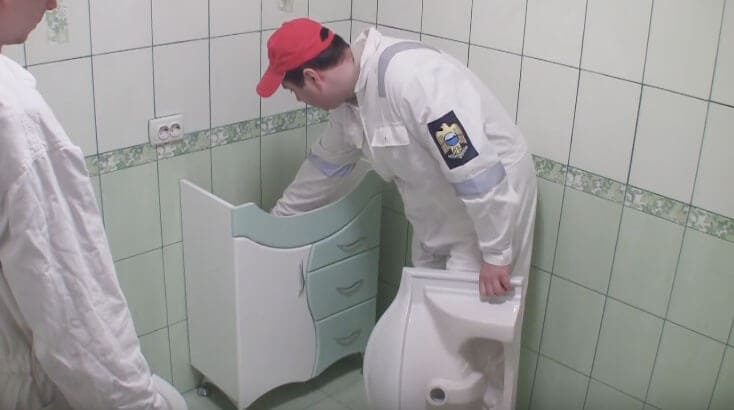 How to assemble a cabinet with a sink.