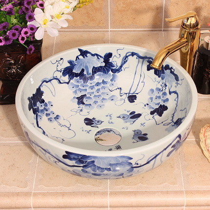 Porcelain washbasin with painting.